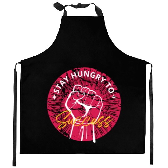 Stay hungry to success Kitchen Aprons