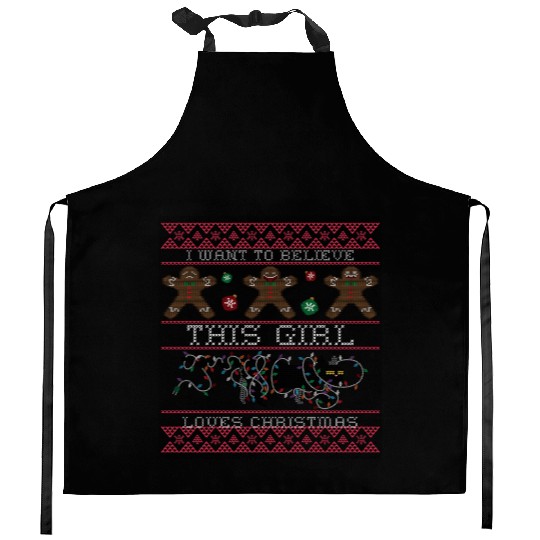 i want to believe this girl loves christmas Saint Kitchen Aprons