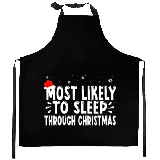 most likely to sleep through christmas Kitchen Aprons