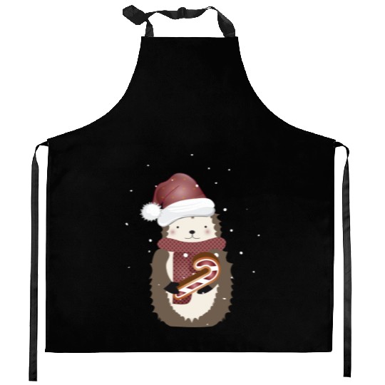 cute hedgehog for christmas with candy cane Kitchen Aprons