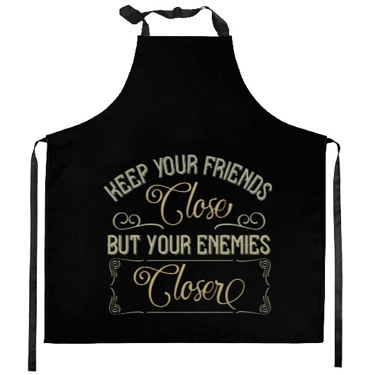 keep your friends close but your enemies closer Kitchen Aprons