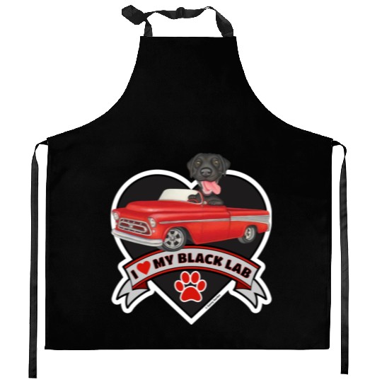 Cute black lab in classic truck inside a heart Kitchen Aprons