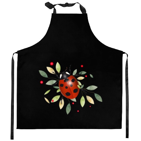 red glowing ladybug with green leaves Kitchen Aprons