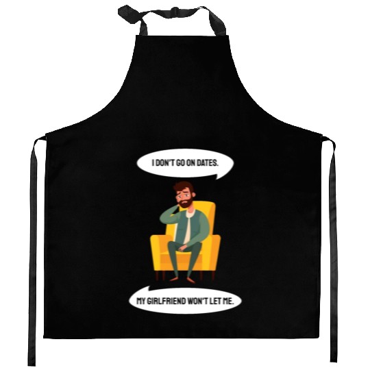 Sad man sitting in an armchair Kitchen Aprons