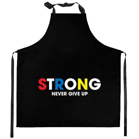 strong never give up Kitchen Aprons