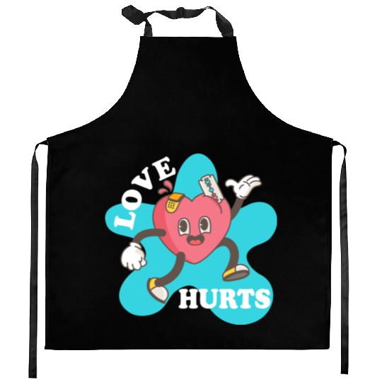 love hurts Kitchen Aprons