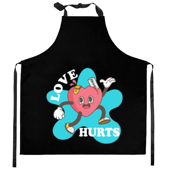 love hurts Kitchen Aprons