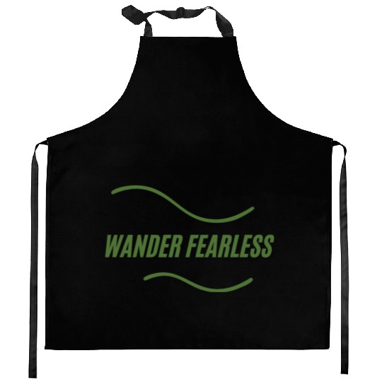 wander fearless adventure Kitchen Aprons