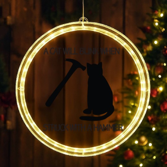 A CAT WILL BLINK WHEN STRUCK WITH A HAMMER LED Christmas Window Lights