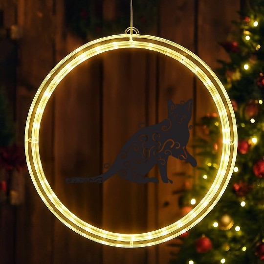 Black magic Cat desk mat , black cat holding on LED Christmas Window Lights