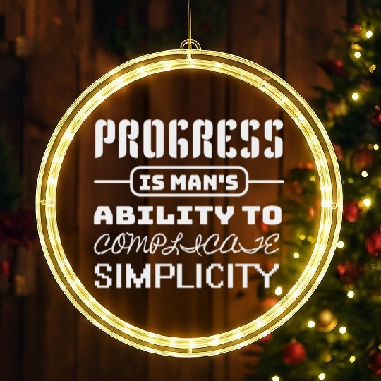 Progress is man's ability to complicate simplicity LED Christmas Window Lights