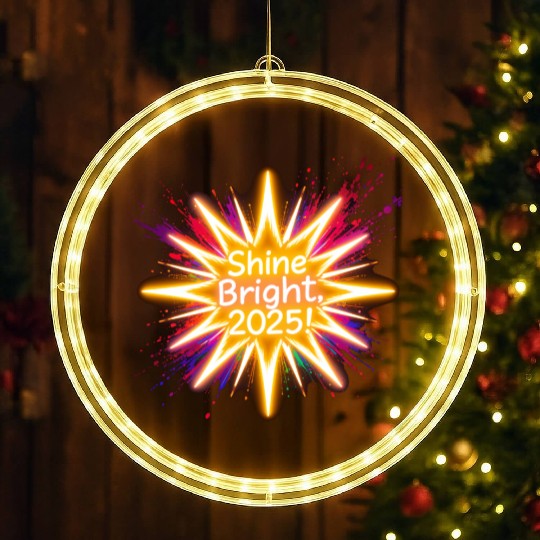A large starburst glowing in neon light with 2025 LED Christmas Window Lights