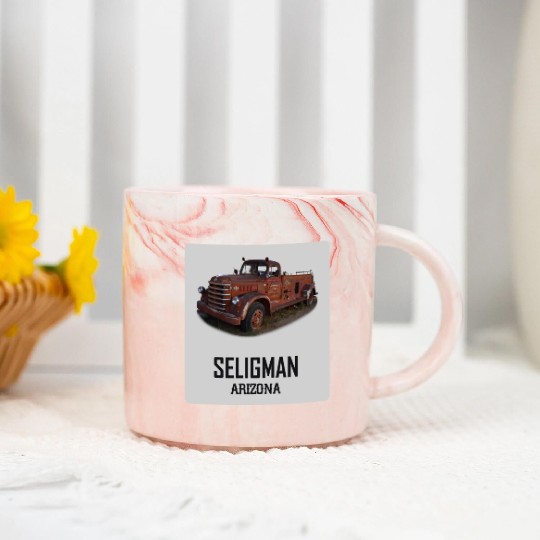 Old car city of Seligman in Arizonna, US Route 66 Marble Mugs