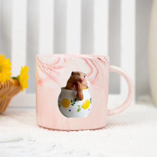 Beautiful hamster Caramella holding a peanut Marble Mugs