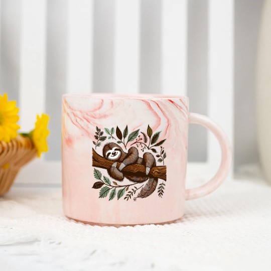 A sloth is sleeping on a tree branch Marble Mugs .