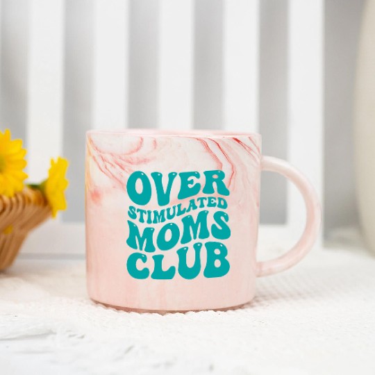 over stimulated moms club Marble Mugs