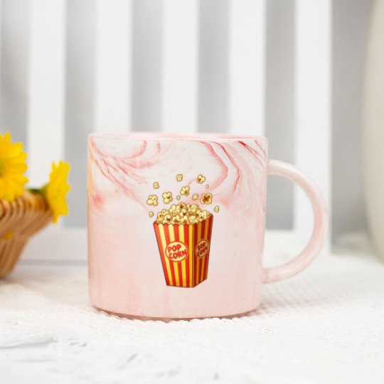 A popcorn box with little popcorn jumping out Marble Mugs