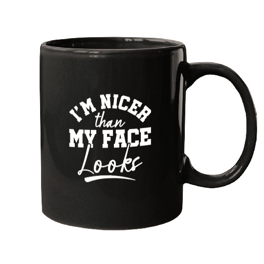 Coffee Fun Introvert Coffee Cat I m nicer than my face looks Mugs