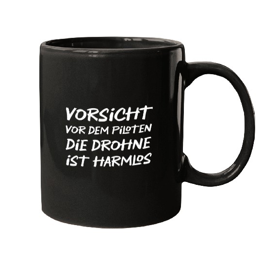 Beware of the pilot the drone is harmless German Quote Mugs
