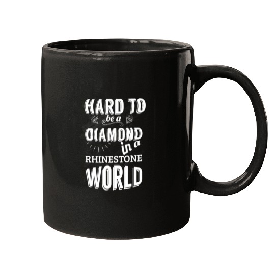 Hard to be a diamond in a rhinestone world Mugs