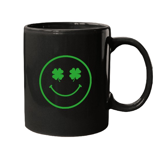 Green shamrock happy face Mugs