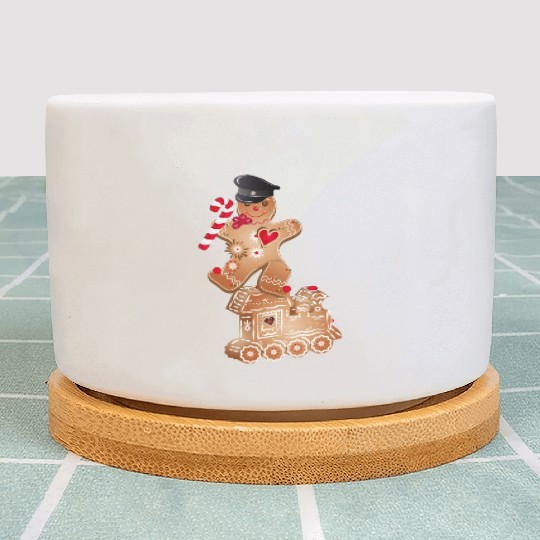 Gingerbread man as engine driver on the locomotive Plant Pots