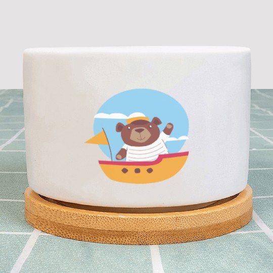 kawaii cute brown baby bear sailing on a boat Plant Pots