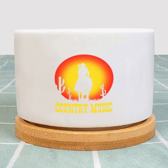 country music cowboy on horse with guitar - sunset Plant Pots