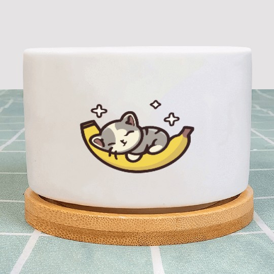 Kitten Sleeping On A Banana Plant Pots