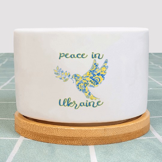 Dove of peace in Ukraine drawing in national color Plant Pots