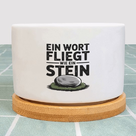 Do Not Disturb Rock Resting Peacefully on Grass Plant Pots