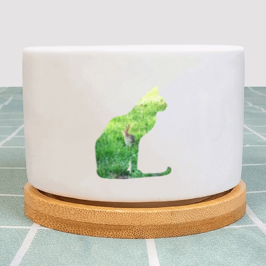 Cat Ate The Rabbit in The Grass Plant Pots