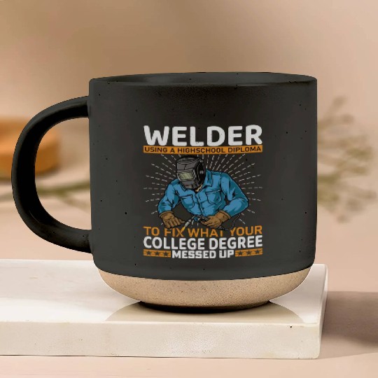 Welder using a high school Pottery Mugs
