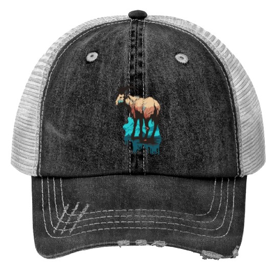 a mountain goat lives in the mountains Print Trucker Hats