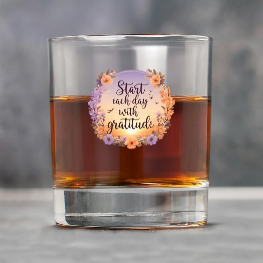 Serene Sunrise with Gratitude Quote and Soft Rock Glasses