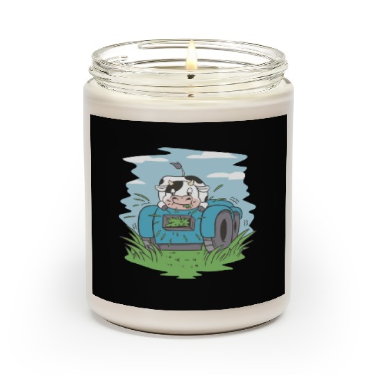 Cow eating grass tractor Cow eating grass tractor Scented Candles