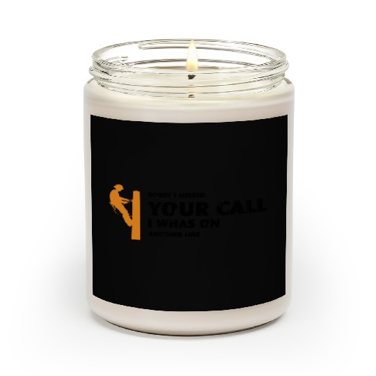 Orange silhouette of a lineman climbing a utility Scented Candles