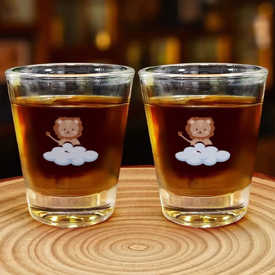 Baby lion flying in the clouds. Shot Glasses