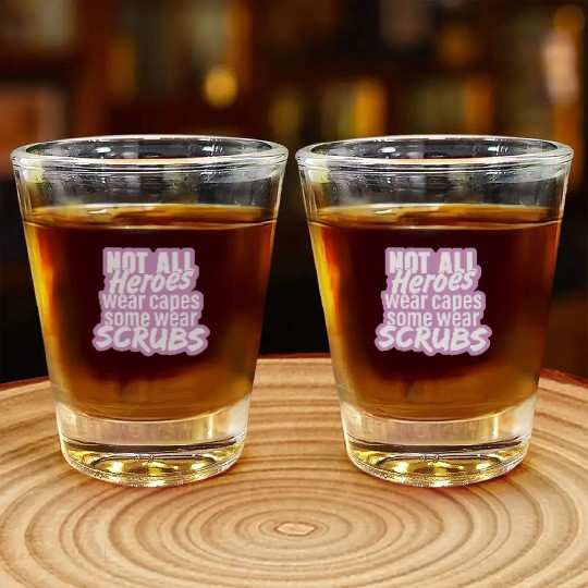 Not all heroes wear capes, some wear scrubs pinky Shot Glasses