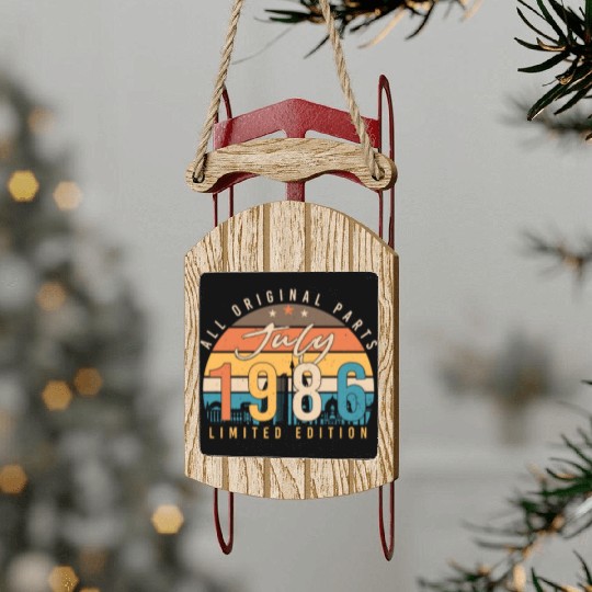 1986 July Limited Edition Sled Ornaments