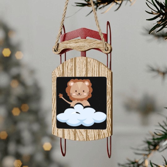 Baby lion flying in the clouds. Sled Ornaments