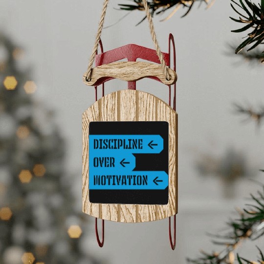 discipline over motivation quote Sled Ornaments