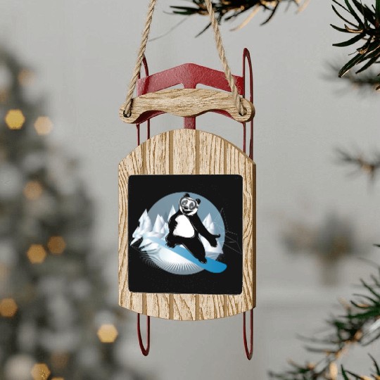 cool panda bear is snowboarding in the mountains Sled Ornaments