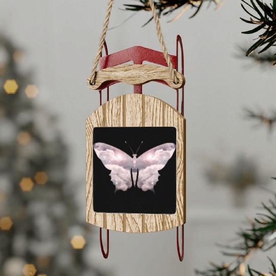 A heavenly butterfly made of delicate clouds Sled Ornaments