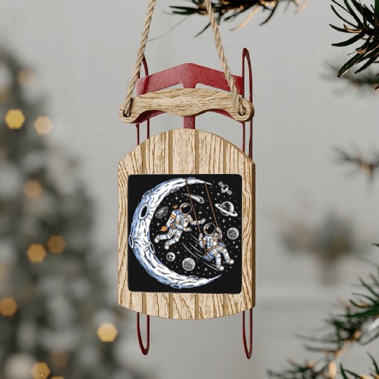 Astronauts on swing on moon Sled Ornaments