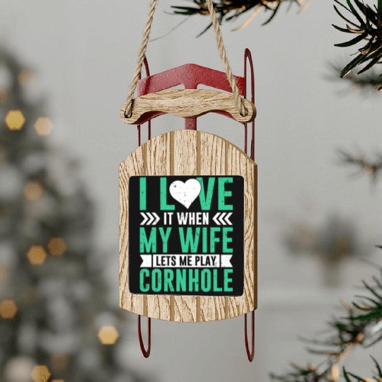 I love it when my wife lets me play cornhole Sled Ornaments