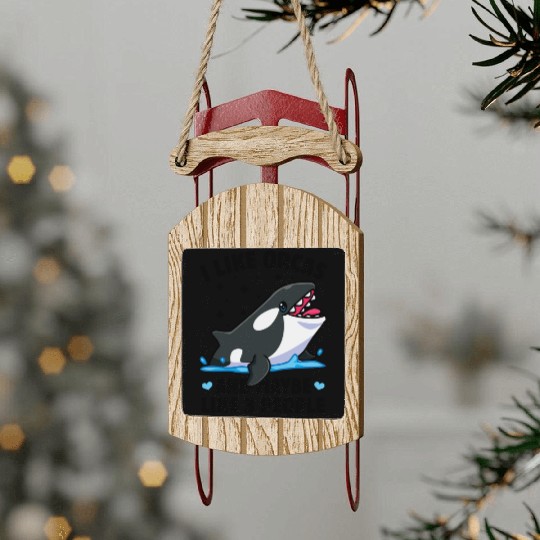 I like orcas and maybe like 3 people killer whale Sled Ornaments