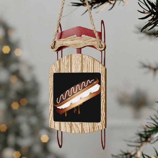 Illustration of a stuffed eclair with cream Sled Ornaments
