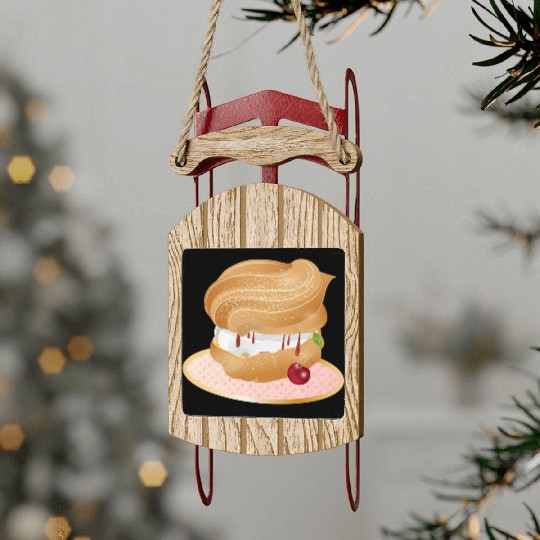 Cream puffs filled with cream and cherries Sled Ornaments