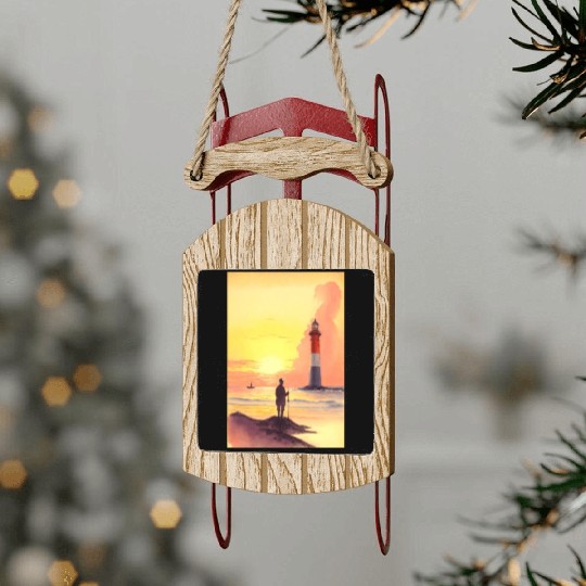 Serene Sunrise Beach Scene with Lighthouse and Fis Sled Ornaments
